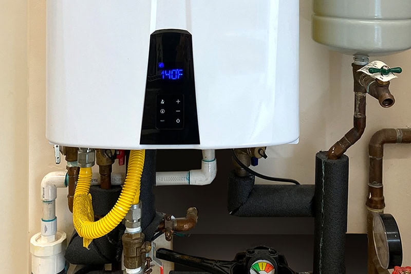 What Is a Tankless Water Heater? A tankless water heater hooked up and running.